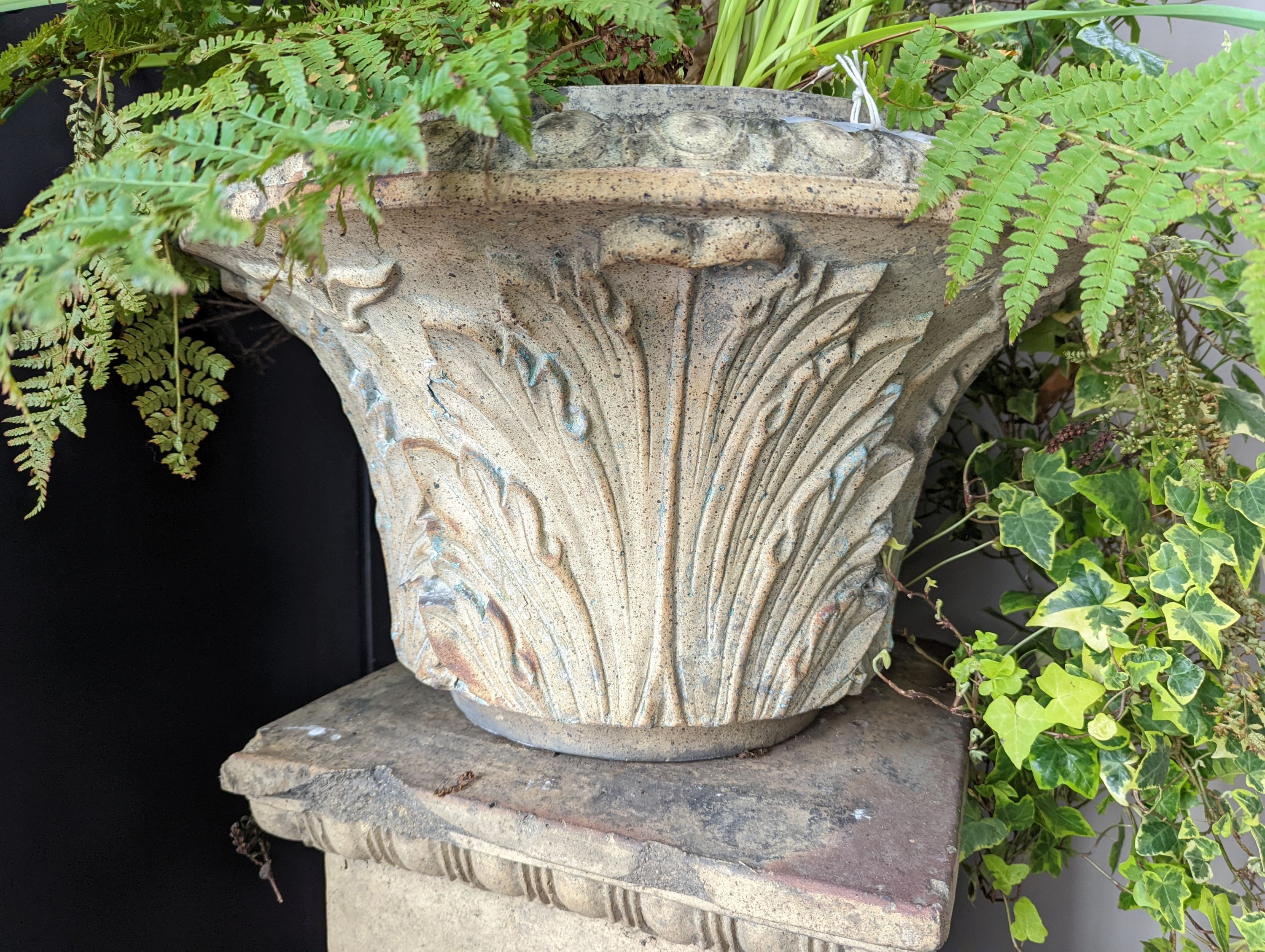 A pair of Victorian earthenware circular garden urns square plinth bases, diameter 58cm, height 96cm